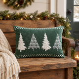 4 Christmas Trees Green Velvet Pillow on a Christmas-themed wooden bench