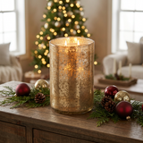 Matte Gold Bubble Glass Hurricane Candle in a Christmas setting