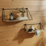 Cabin lifestyle image with a matte black bear figurine