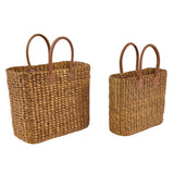 Brinkley Rattan Leather Handle Totes Set of 2 — angled front view showing woven texture and handle detail