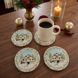 Christmas Barn coasters with coffee mug on a back coaster