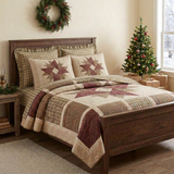Cider Spice Quilt with smooth-edged shams and ruffled plaid pillowcases