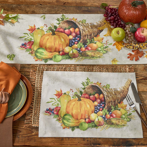 Cornucopia Fall Table Runner 36" Thanksgiving table runner and placemats with pumpkins, fruits, and cornucopia on a wooden table.