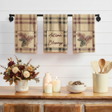 Tea towel lifestyle image with lit candles