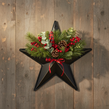 Faceted metal star wall hanging with Christmas pine, berries, and pinecones