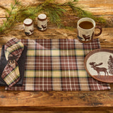 Wooden table setting with Friar Brown plaid placemat, moose-themed mug, salt and pepper shakers, and decorative plate.