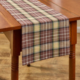 Friar Brown Plaid Table Runner on a wooden table on a wooden table