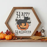 Happy Halloween Black Cat Hexagon Wood Sign leaning on a shelf styled with mini pumpkins, acorns, fall leaves, wheat, and a mini vintage lantern