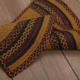 Heirloom Farm Primitive Crow Half Circle Rug close-up of jute blend braid texture in mustard tan, raven black, and burgundy