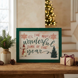It's The Most Wonderful Time Snowman Framed Sign in a Christmas console-table setting