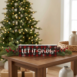 Revised horizontal Let It Snow sign in a Christmas setting