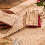 Simmons plaid cloth napkins folded and styled on a farmhouse dining table place setting
