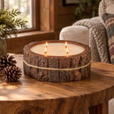 Tree Bark candle lifestyle image with pinecones