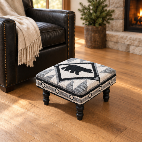 Tribal Bear Hooked Stool with revised scale beside the black chair