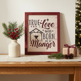True Love Was Born In A Manger Framed Sign in a Christmas console-table setting
