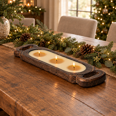 Three-wick candle in a Christmas setting