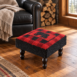 Buffalo Check Bear Hooked Stool beside a black leather chair