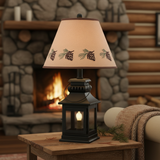 Cambridge black lantern lamp with pinecone shade in a rustic cabin
