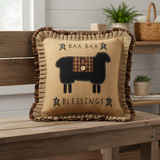 Heirloom Farm Baa Baa Blessings Pillow on a farmhouse wood bench